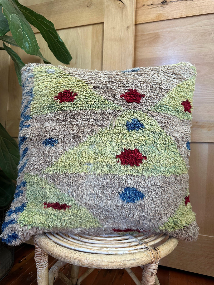 Hand-knotted, shaggy purple and green Turkish throw pillow, 20x20 inches, wool front with geometric design and pops of blue and maroon, cotton backing—boho home decor. 