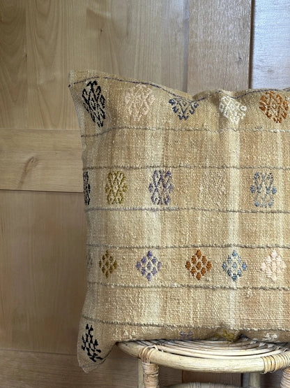 26 by 26 tan plaid turkish pillow that also doubles as a floor cushion with multi-colored floral embroidery