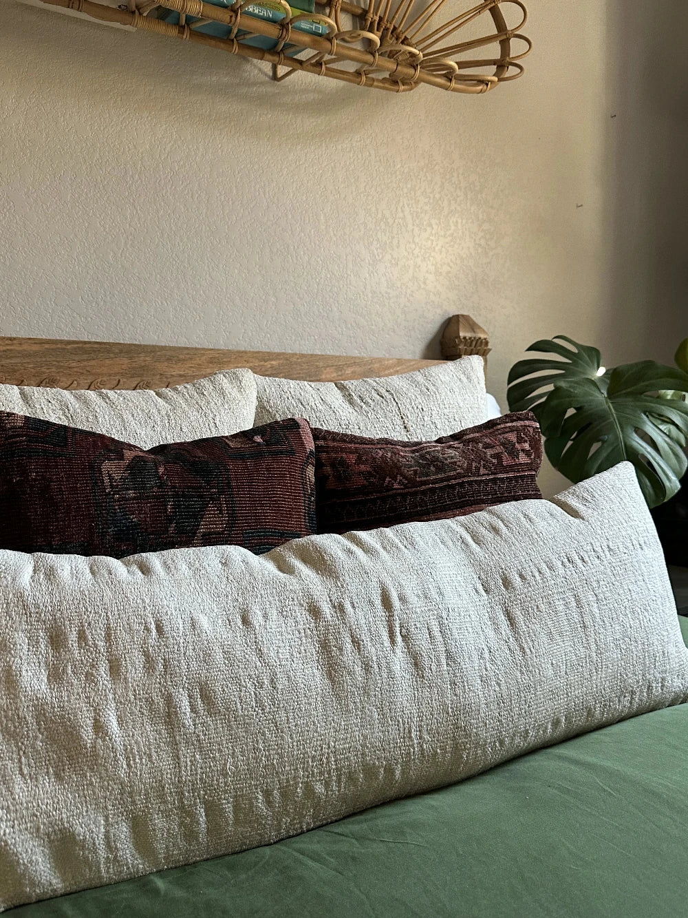 12 by 46 cream colored Turkish lumbar pillow woven from a soft hemp material