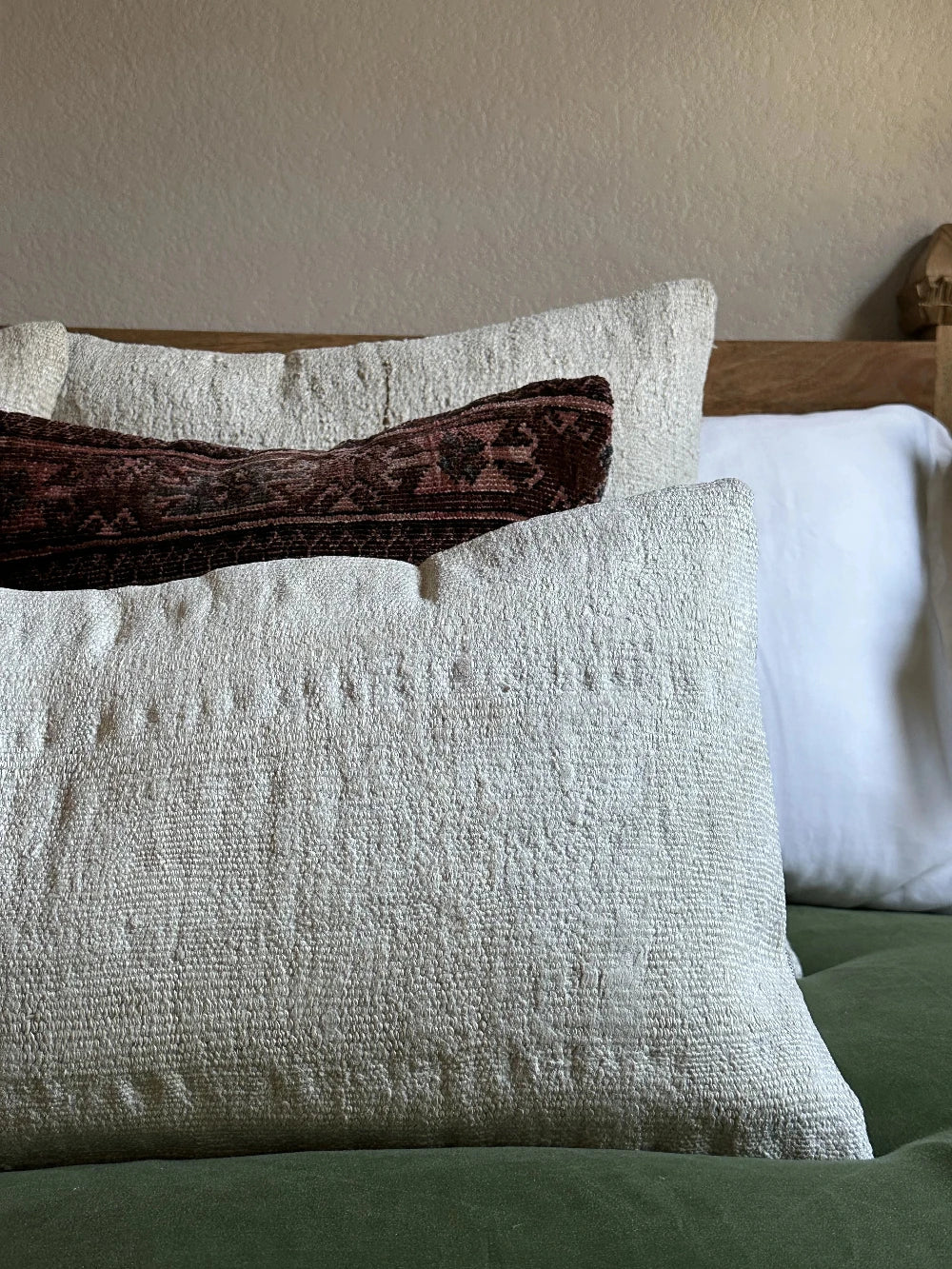 12 by 46 cream colored Turkish lumbar pillow woven from a soft hemp material