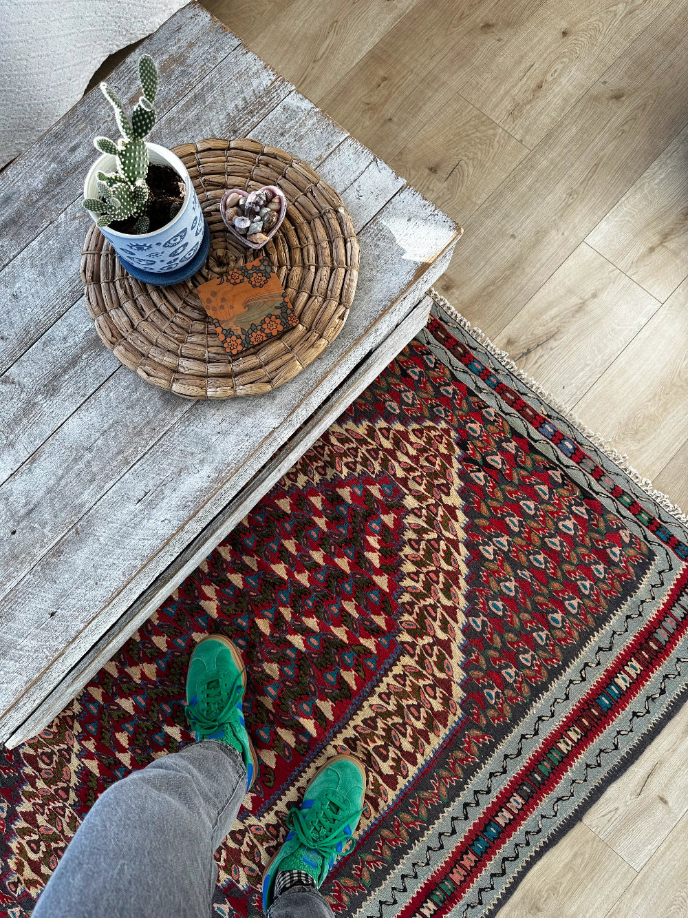 Handwoven Senneh Kilim rug, featuring intricate geometric patterns, a central medallion design, and rich earthy red, deep blue, and neutral tones. Flat-woven wool rug with fine detailing and a slit tapestry weave, perfect for bohemian, modern, or traditional home décor.