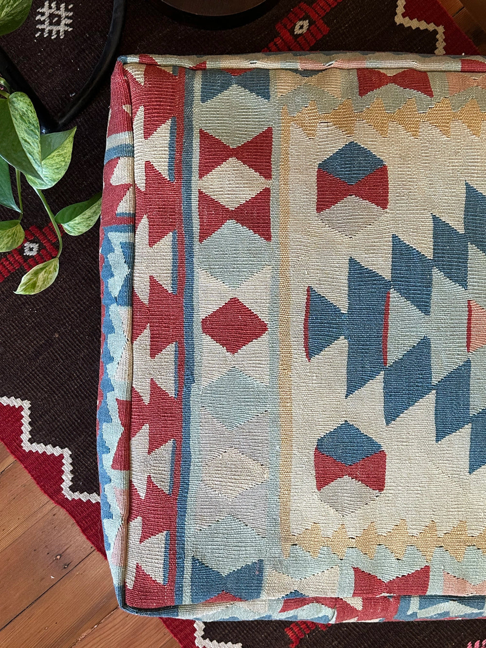 Handmade vintage Turkish rug pouf with blue & neutral tones, up-cycled from authentic wool Kilim rugs. Perfect as a unique bohemian floor cushion, ottoman, or accent seating for living rooms, bedrooms, or cozy spaces. Ethically crafted by artisans in Turkey.