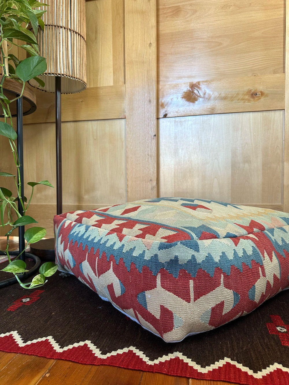 Handmade vintage Turkish rug pouf with blue & neutral tones, up-cycled from authentic wool Kilim rugs. Perfect as a unique bohemian floor cushion, ottoman, or accent seating for living rooms, bedrooms, or cozy spaces. Ethically crafted by artisans in Turkey.