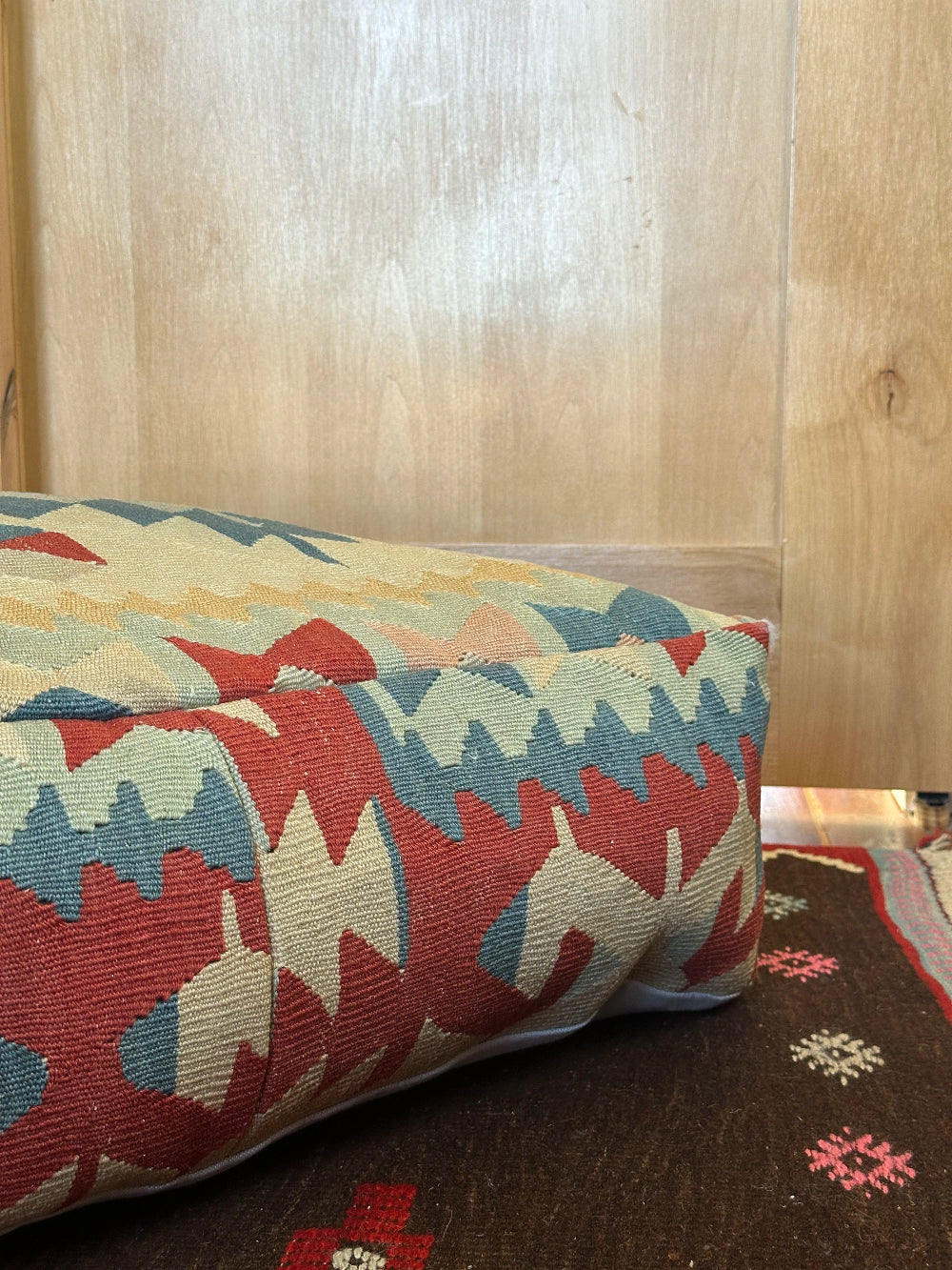 Handmade vintage Turkish rug pouf with blue & neutral tones, up-cycled from authentic wool Kilim rugs. Perfect as a unique bohemian floor cushion, ottoman, or accent seating for living rooms, bedrooms, or cozy spaces. Ethically crafted by artisans in Turkey.