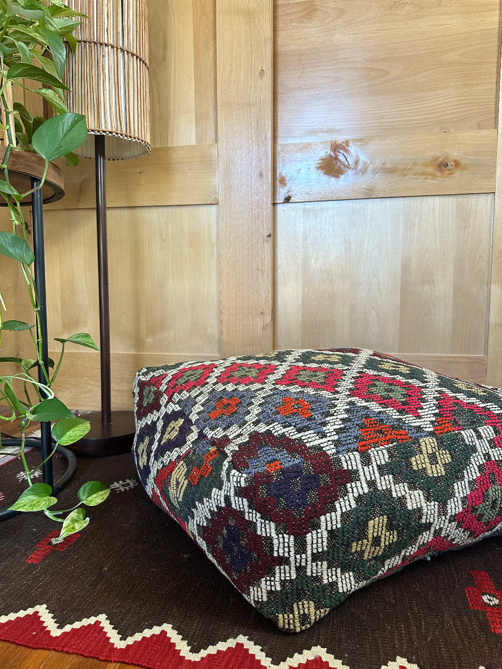 Handmade vintage Turkish rug pouf with colorful tones, up-cycled from authentic wool Kilim rugs. Perfect as a unique bohemian floor cushion, ottoman, or accent seating for living rooms, bedrooms, or cozy spaces. Ethically crafted by artisans in Turkey.