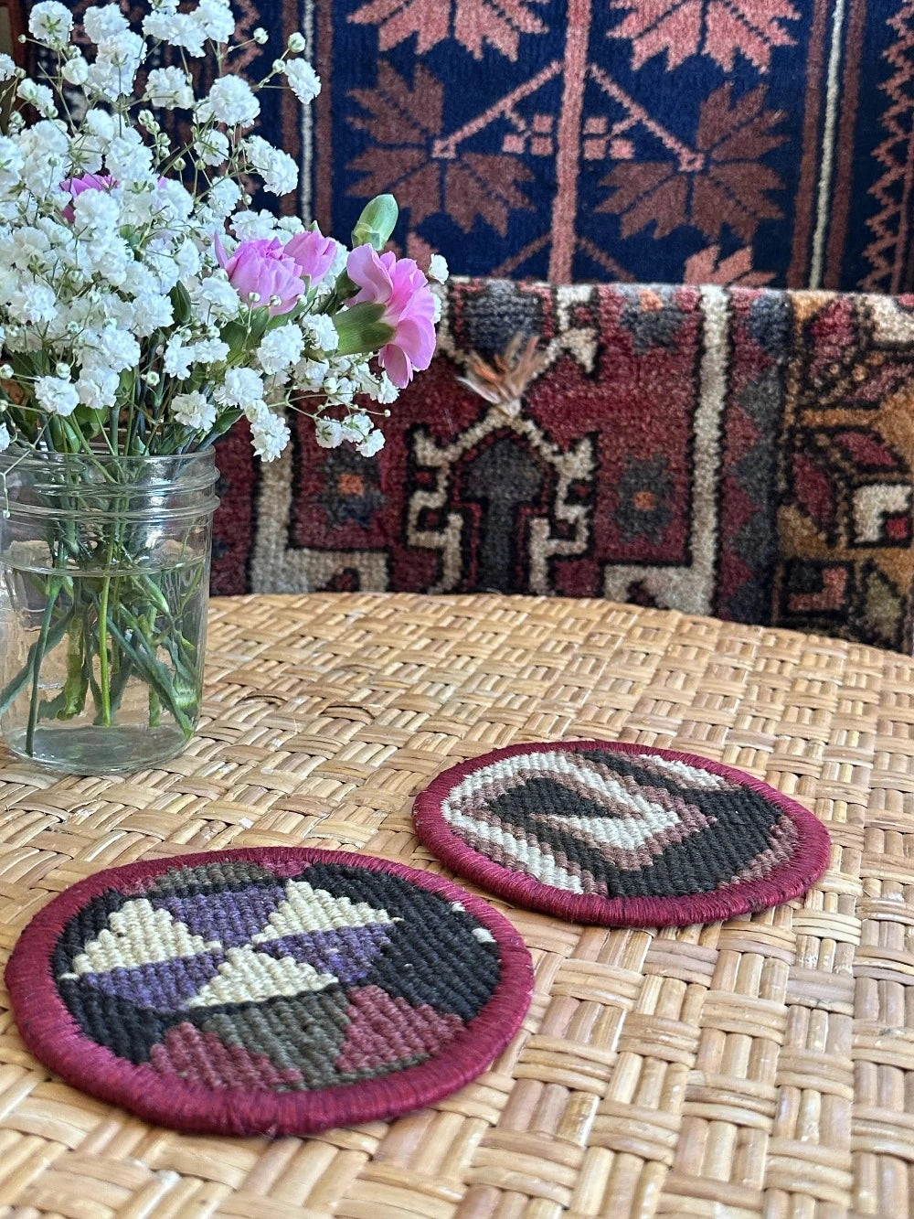 3.75 diameter Turkish coaster set made from Turkish rugs and pillow scraps featuring a colorful geometric design