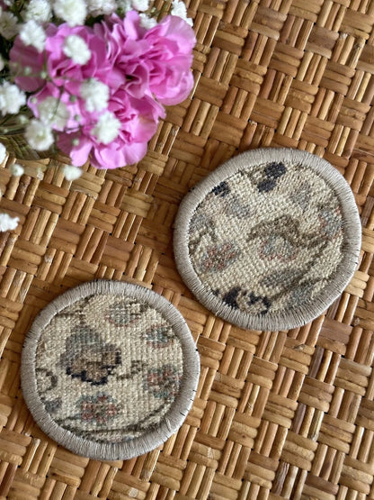 3.75 inches in diameter Turkish rug coasters upcycled and made from scraps of Turkish rugs featuring a neutral floral design
