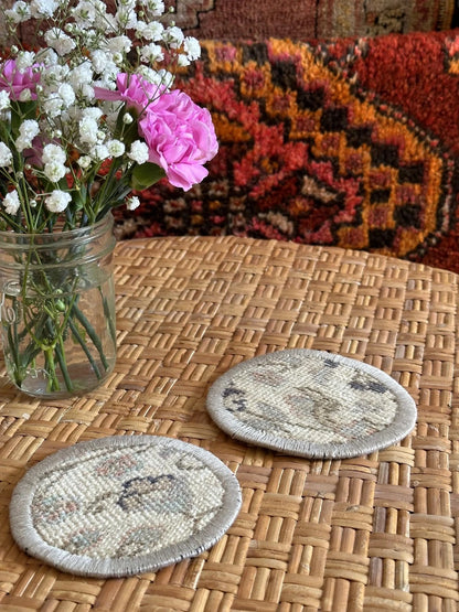3.75 inches in diameter Turkish rug coasters upcycled and made from scraps of Turkish rugs featuring a neutral floral design