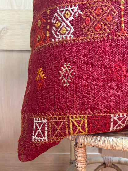 Handwoven red embroidered Turkish throw pillow, 26x26 inches, wool front with geometric design and pops of yellow and white, cotton backing—boho home decor.