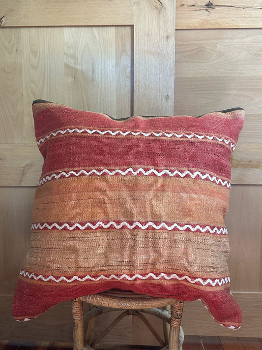 Handwoven red and orange sherbet Turkish throw pillow, 26x26 inches, wool front with geometric design and pops of white, cotton backing—boho home decor.