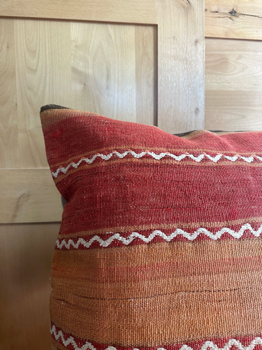 Handwoven red and orange sherbet Turkish throw pillow, 26x26 inches, wool front with geometric design and pops of white, cotton backing—boho home decor.