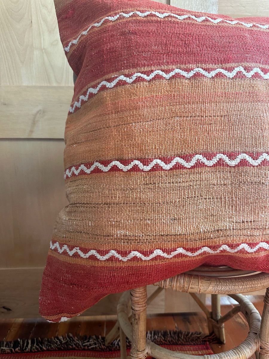 Handwoven red and orange sherbet Turkish throw pillow, 26x26 inches, wool front with geometric design and pops of white, cotton backing—boho home decor.