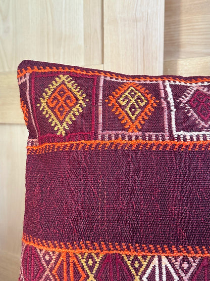 Handwoven red and orange Turkish lumbar pillow, 16x24 inches, wool front with geometric design and pops of white, cotton backing—boho home decor.