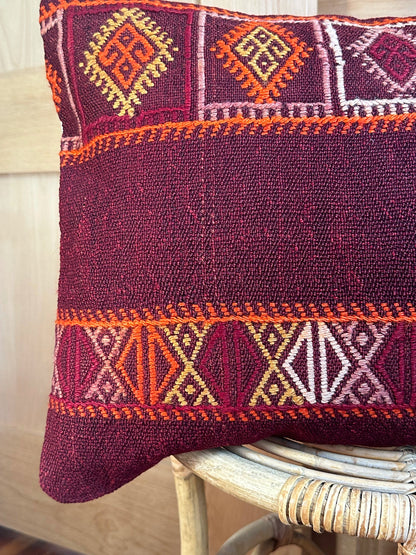 Handwoven red and orange Turkish lumbar pillow, 16x24 inches, wool front with geometric design and pops of white, cotton backing—boho home decor.