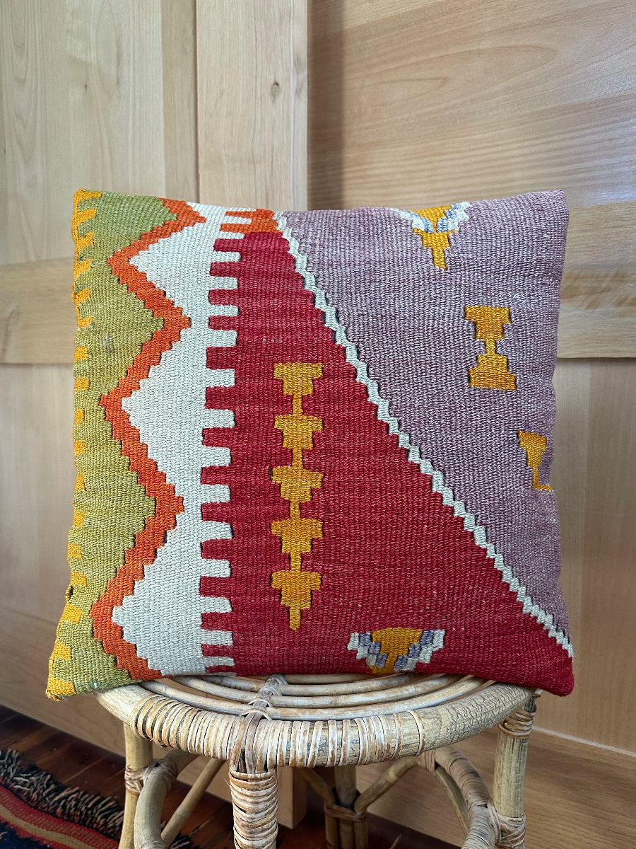 Handwoven colorful geometric Turkish throw pillow, 16x16 inches, wool front and cotton backing—boho home decor.