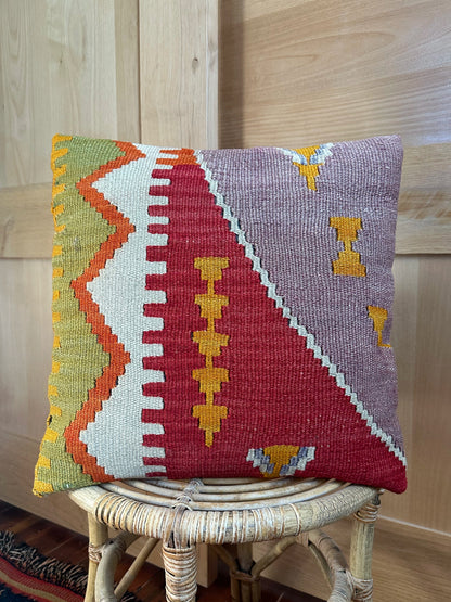 Handwoven colorful geometric Turkish throw pillow, 16x16 inches, wool front and cotton backing—boho home decor.