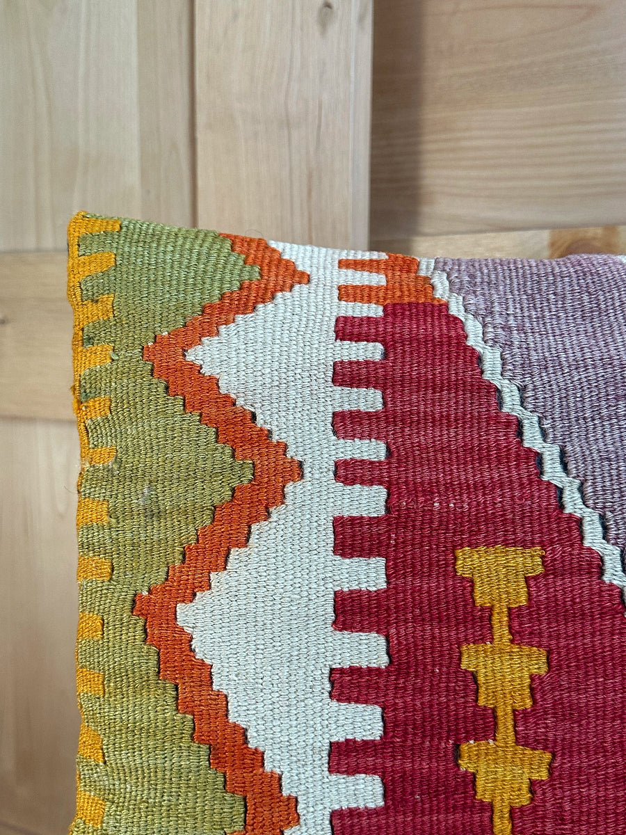 Handwoven colorful geometric Turkish throw pillow, 16x16 inches, wool front and cotton backing—boho home decor.