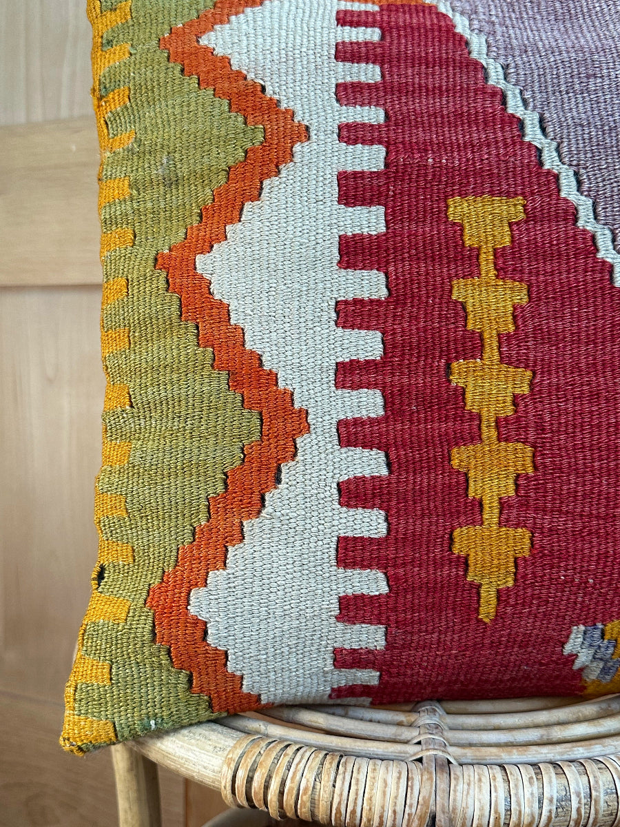 Handwoven colorful geometric Turkish throw pillow, 16x16 inches, wool front and cotton backing—boho home decor.