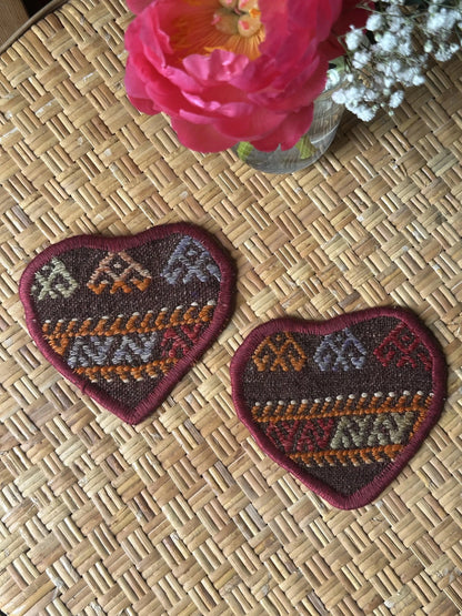 Unique 6.5 by 5.5 inch Turkish fabric coasters in the shape of a heart, upcycled from old turkish rugs and pillow scraps