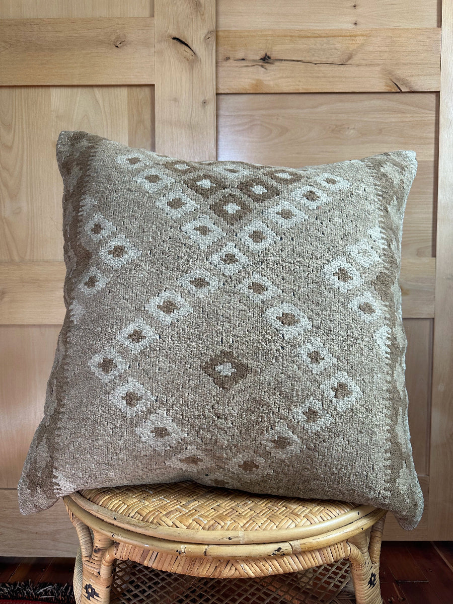 Handwoven neutral Turkish throw pillow, 26x26 inches, wool front with geometric design and pops of white, cotton backing—boho home decor.