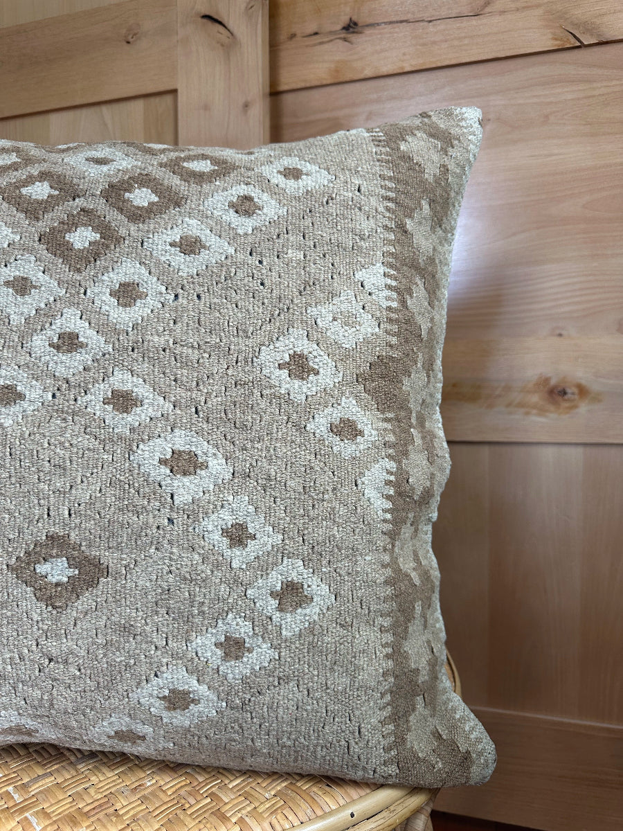 Handwoven neutral Turkish throw pillow, 26x26 inches, wool front with geometric design and pops of white, cotton backing—boho home decor.