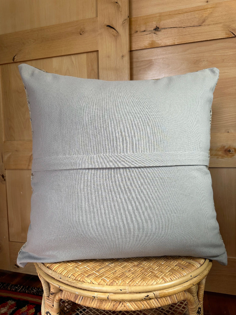 Handwoven neutral Turkish throw pillow, 26x26 inches, wool front with geometric design and pops of white, cotton backing—boho home decor.