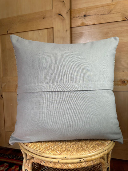 Handwoven neutral Turkish throw pillow, 26x26 inches, wool front with geometric design and pops of white, cotton backing—boho home decor.