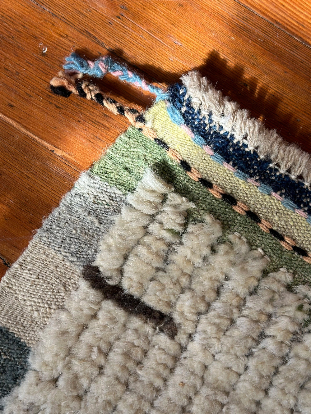 Hand-knotted mini Moroccan rug with a plush high-pile texture. Crafted from 100% wool, featuring a minimalist yet timeless design, perfect for modern, bohemian, or eclectic home décor.