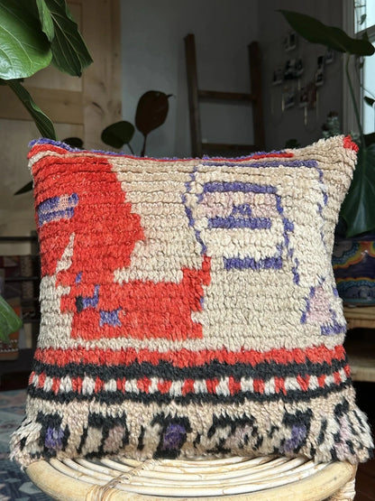 15 by 15 Turkish throw pillow featuring shaggy material and bright purple and red tones upcycled from a Turkish rug