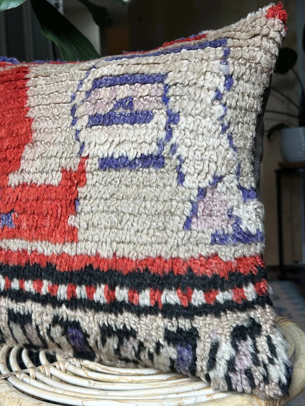 15 by 15 Turkish throw pillow featuring shaggy material and bright purple and red tones upcycled from a Turkish rug