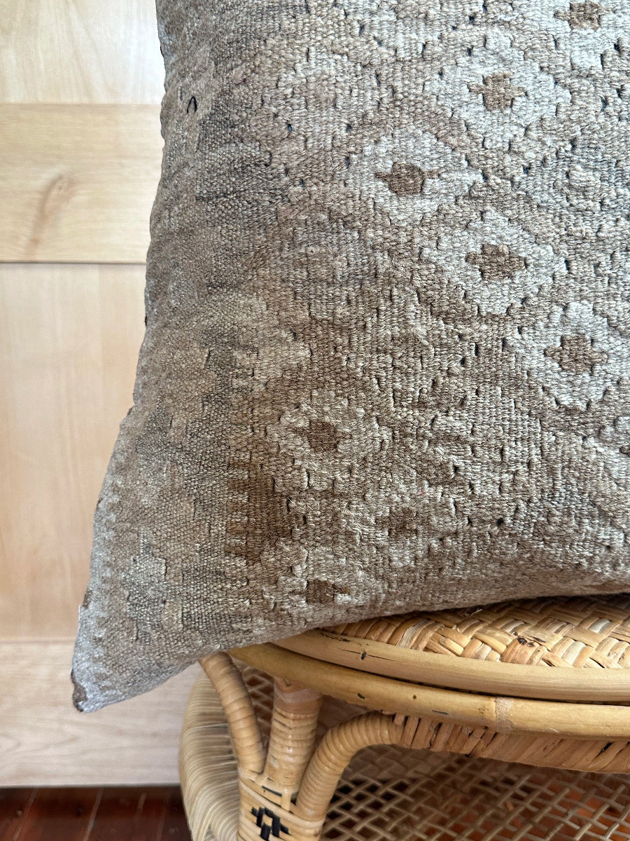 Handwoven neutral Turkish throw pillow, 26x26 inches, wool front with repeating geometric design, cotton backing—boho home decor.