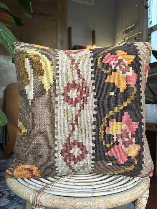 15 by 15 neutral Turkish throw pillow featuring muted tones and a beautiful floral pattern upcycled from an old Turkish rug