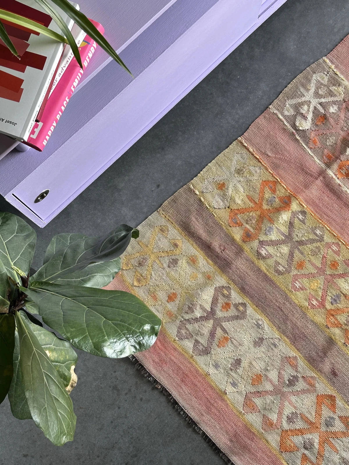 small Turkish flatwoven kilim rug featuring sunset coloring, sherbet pink and sunshine yellow and geometric striped pattern throughout