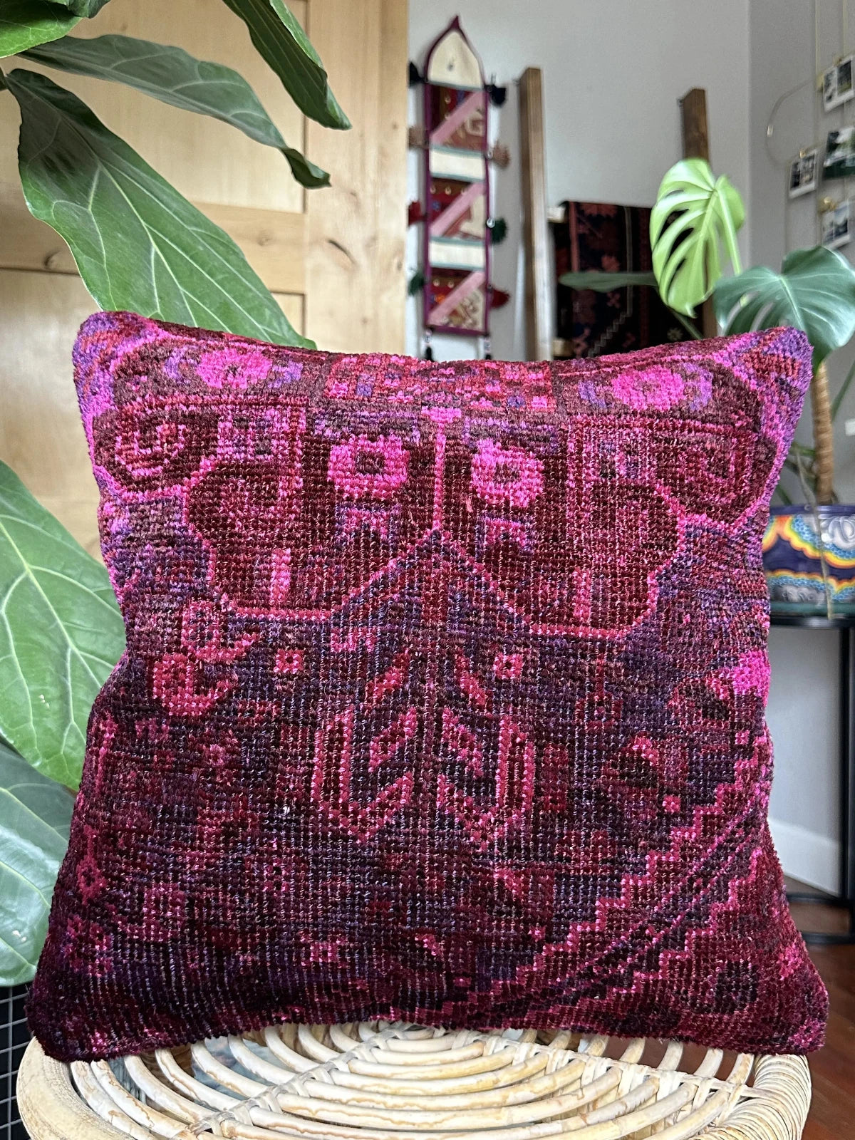 16 by 16 handmade Turkish throw pillow featuring hot pink and deep purple tones and a geometric floral design