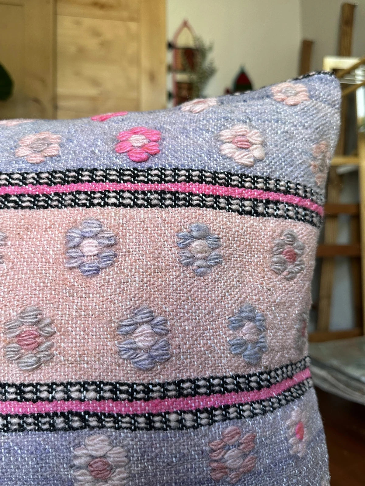 16 by 24 inch handmade Turkish lumbar pillow featuring a pink and purple striped design and embroidered pink flowers throughout