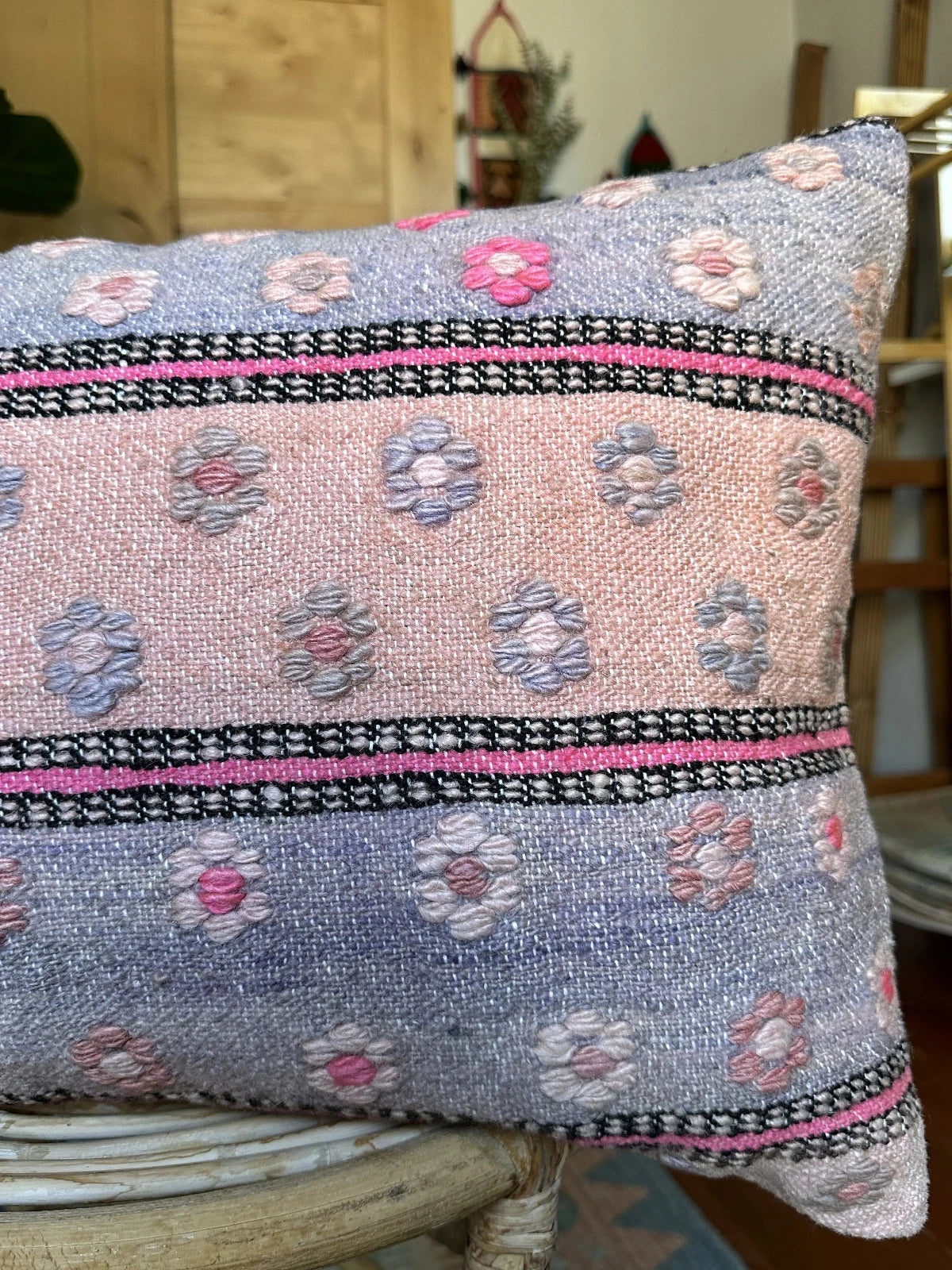 16 by 24 inch handmade Turkish lumbar pillow featuring a pink and purple striped design and embroidered pink flowers throughout