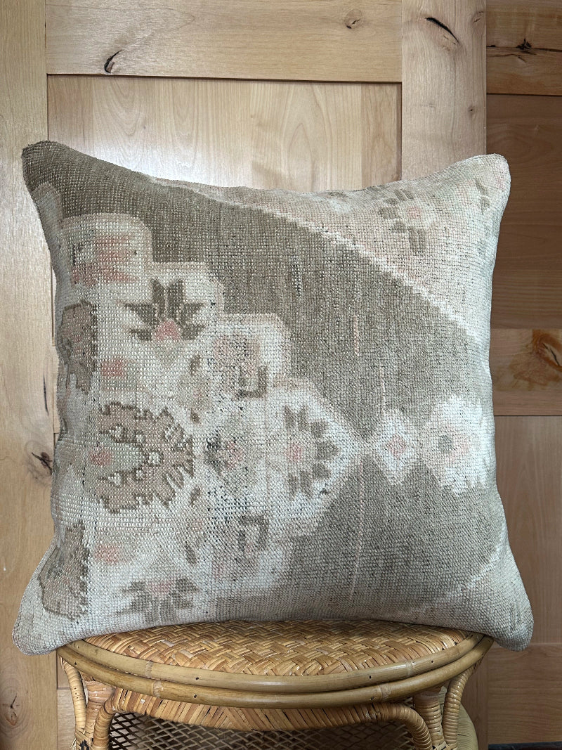 26x26 low-pile pillow made from upcycled Turkish rugs. Artisan-crafted in muted taupe, beige, and soft sage tones.