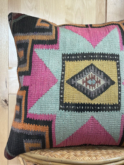 "Handwoven Turkish Kilim Pillow Cover – Vintage Wool Cushion with Bold Southwestern Star Pattern in Pink, Teal, Yellow, and Black – Boho and Eclectic Home Decor Accent