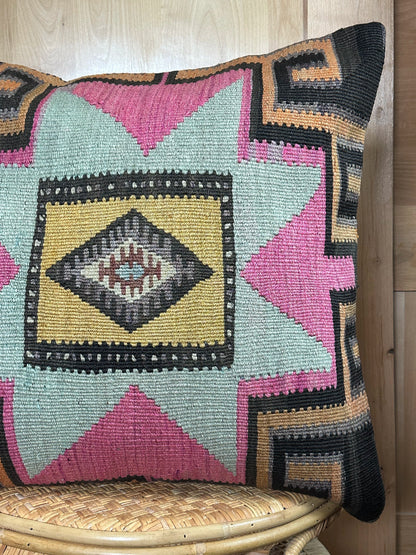 "Handwoven Turkish Kilim Pillow Cover – Vintage Wool Cushion with Bold Southwestern Star Pattern in Pink, Teal, Yellow, and Black – Boho and Eclectic Home Decor Accent