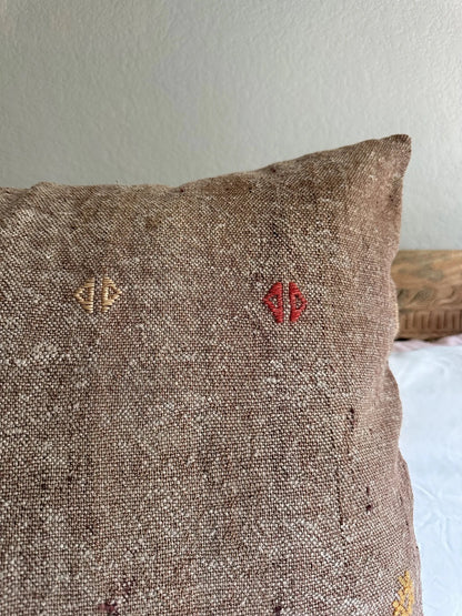 26 by 26 handmade Turkish throw pillow in a beautiful natural wool color and embroidered right side with cream and other colors