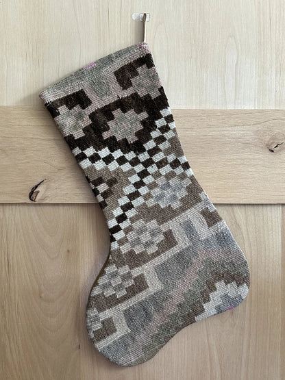 brown and cream handmade Turkish Christmas stocking featuring checkered lines and other geometric shapes