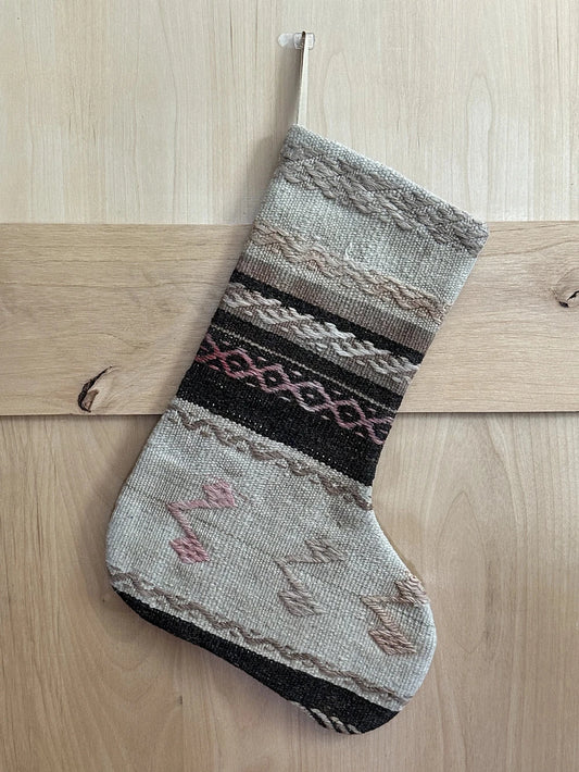 brown and cream striped Christmas Turkish stocking featuring light pink embroidery