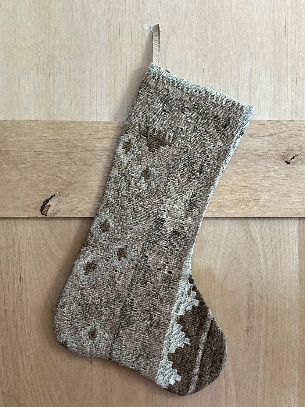 Beige and cream handmade Turkish Christmas stocking featuring geometric designs throughout