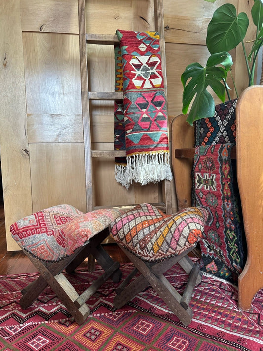 14 by 14 by 14 hand-carved Turkish tea house stools featuring recycled turkish rugs as seat covers