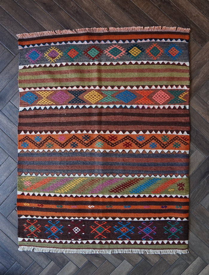 4 by 3 colorful Turkish area rug featuring striped pattern with geometric shapes throughout, perfect for bedroom or kids rooms