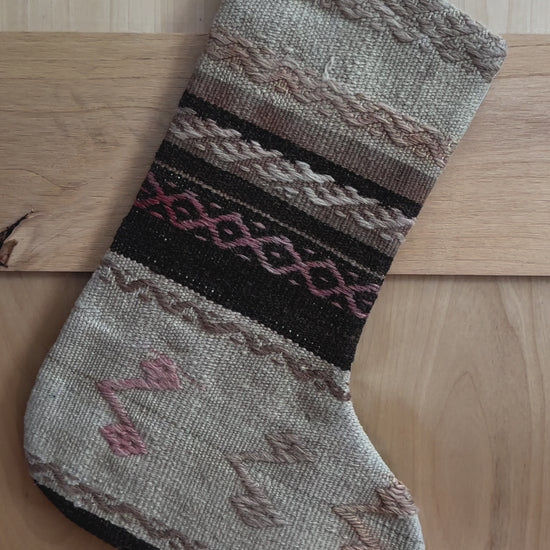 brown and cream striped Christmas Turkish stocking featuring light pink embroidery