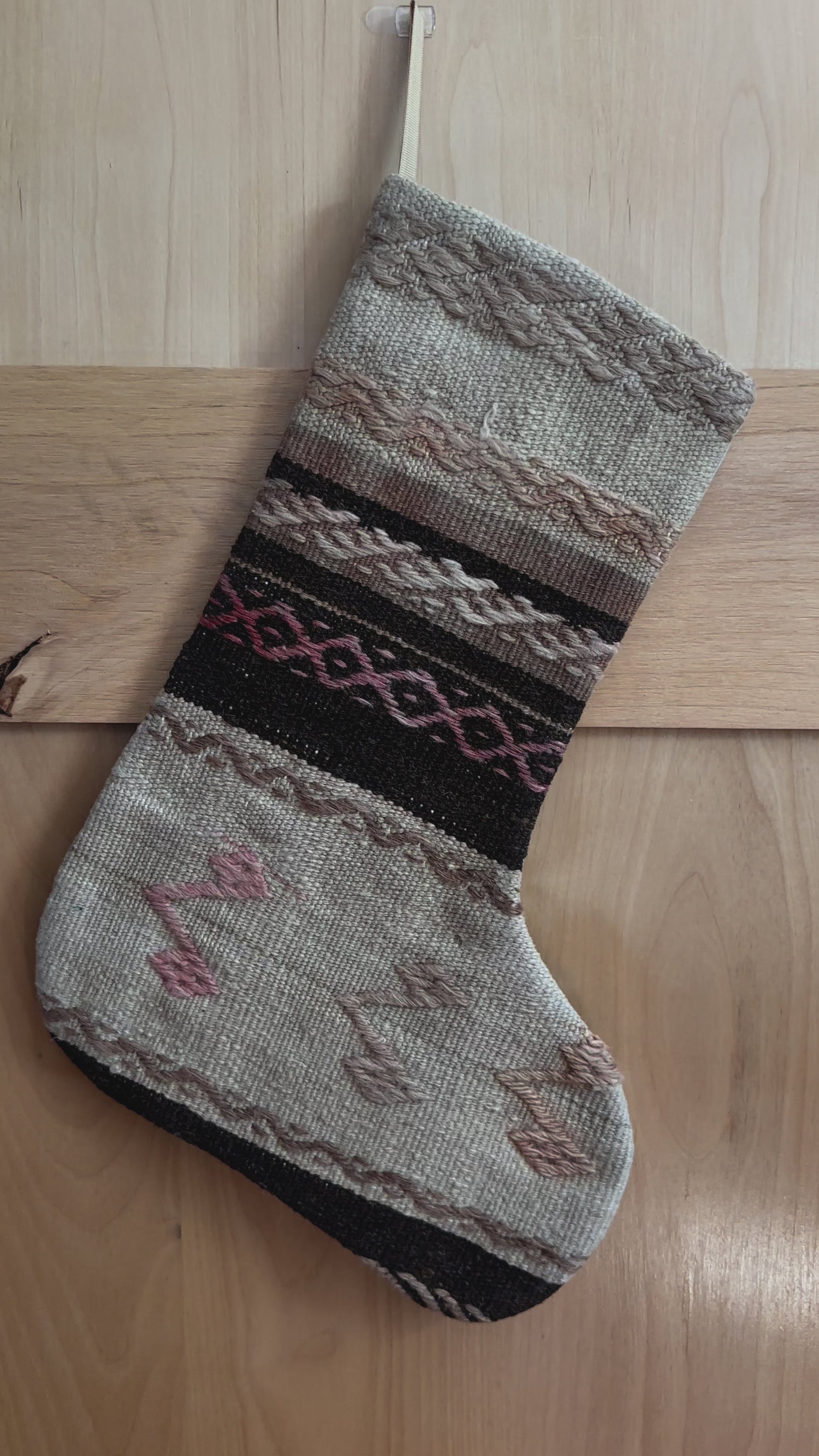 brown and cream striped Christmas Turkish stocking featuring light pink embroidery