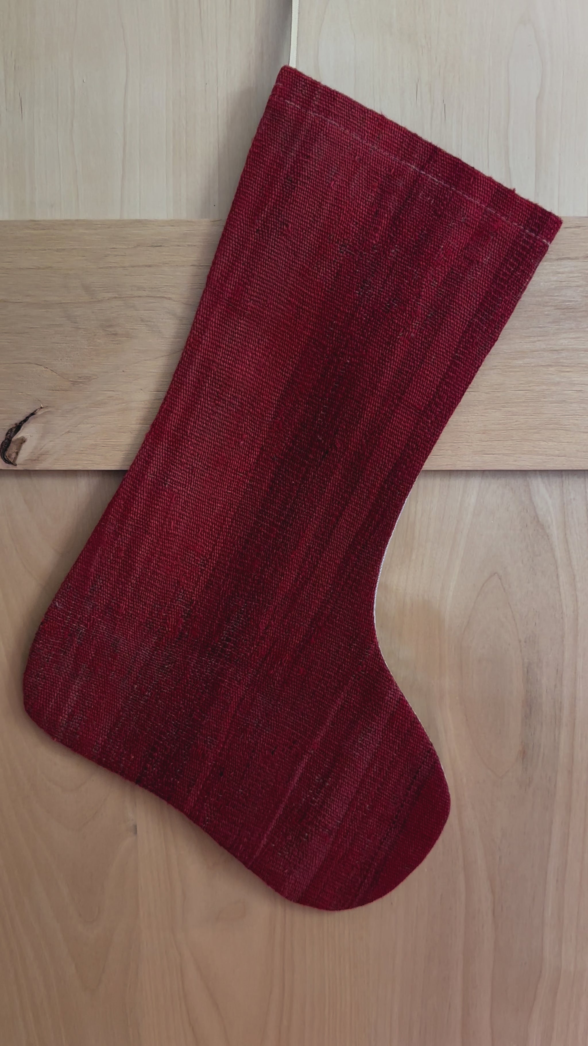 Solid red handmade turkish Christmas stocking featuring a deep fire engine red hue