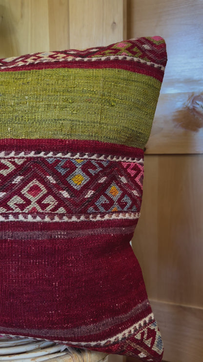 Handwoven red and green Turkish throw pillow, 20x20 inches, wool front with striped design and pops of white and pink, cotton backing—boho home decor.