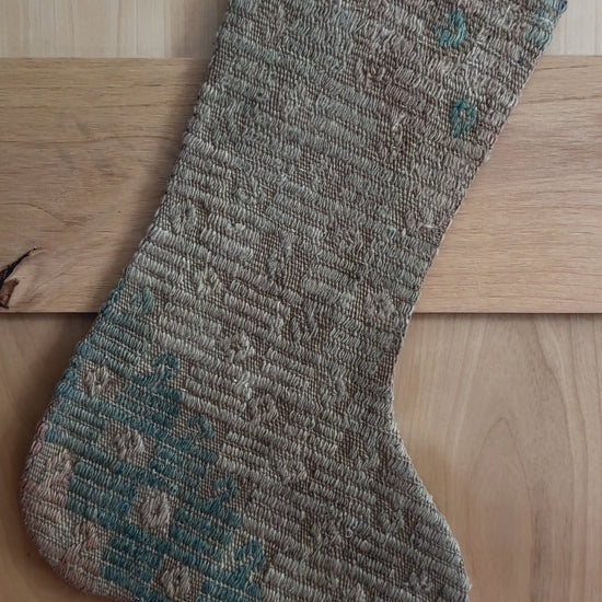 light blue and cream handmade Turkish  Christmas stocking featuring faint embroidered design